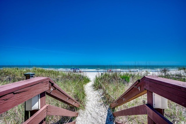property view of water with a beach view