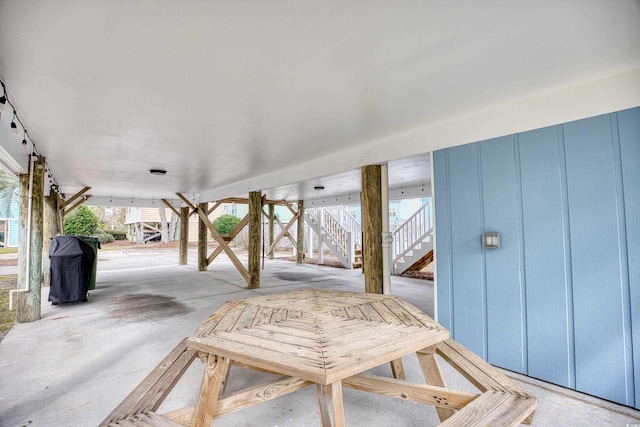 1023 S Sea Bridge Ct, Surfside Beach, SC 29575 - view of patio / terrace featuring stairs and a grill