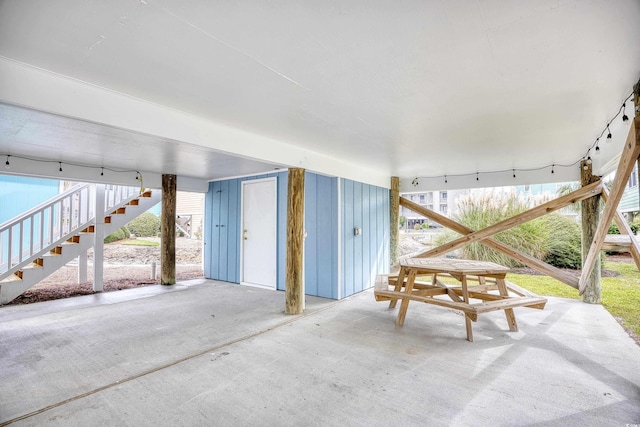 1023 S Sea Bridge Ct, Surfside Beach, SC 29575 - view of patio featuring stairs
