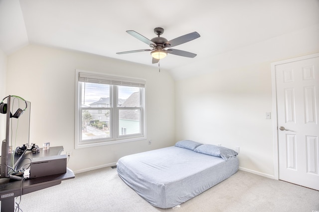 1023 S Sea Bridge Ct, Surfside Beach, SC 29575 - carpeted bedroom with vaulted ceiling, baseboards, ceiling fan, and an office area