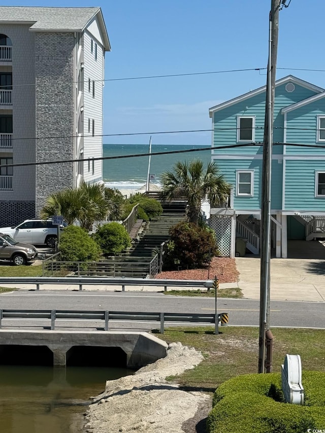 1023 S Sea Bridge Ct, Surfside Beach, SC 29575 - water view featuring stairs