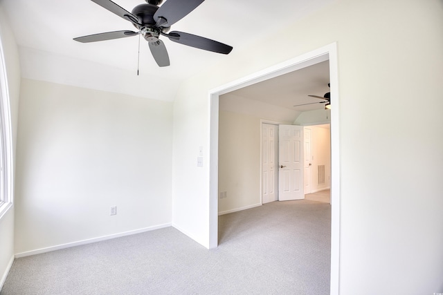 1023 S Sea Bridge Ct, Surfside Beach, SC 29575 - empty room with a ceiling fan, light colored carpet, baseboards, and vaulted ceiling