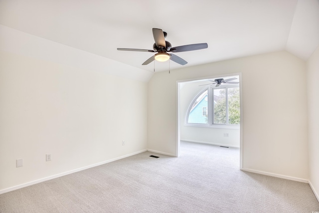 1023 S Sea Bridge Ct, Surfside Beach, SC 29575 - unfurnished room featuring lofted ceiling, ceiling fan, carpet floors, and baseboards