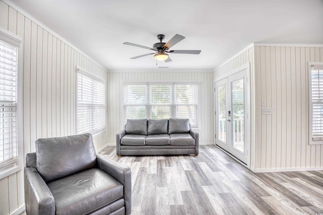 1023 S Sea Bridge Ct, Surfside Beach, SC 29575 - living area featuring crown molding, ceiling fan, wood finished floors, and baseboards