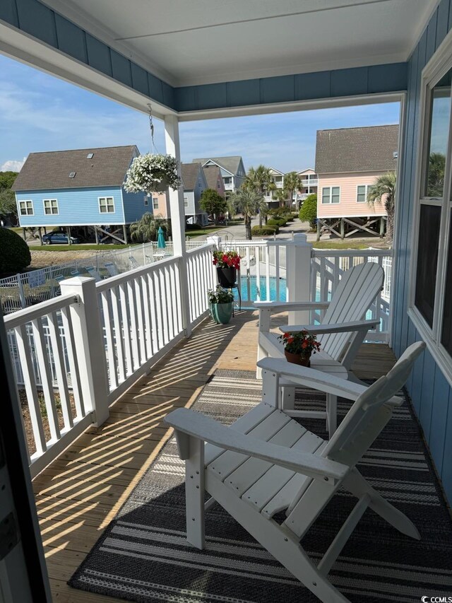 1023 S Sea Bridge Ct, Surfside Beach, SC 29575 - balcony featuring a residential view