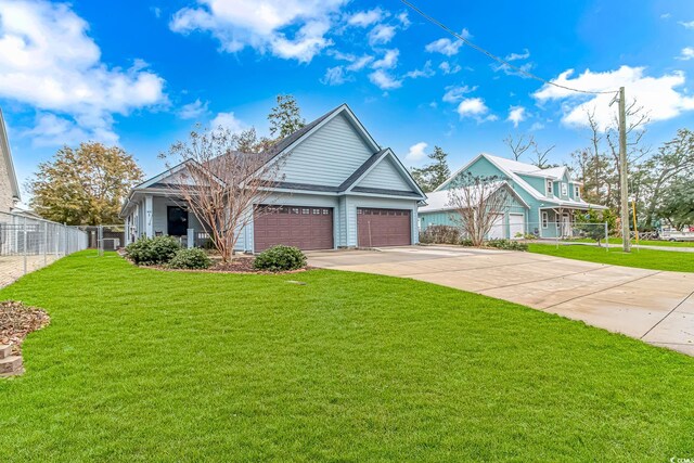craftsman inspired home with driveway and an attached garage