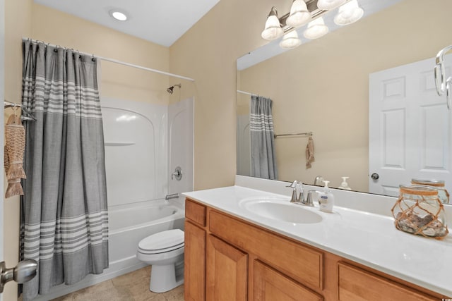 bathroom with shower / tub combo with curtain, vanity, toilet, and tile patterned floors