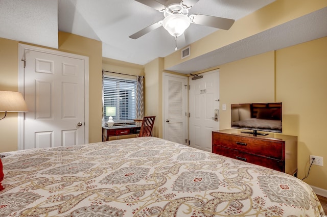 bedroom featuring visible vents and a ceiling fan