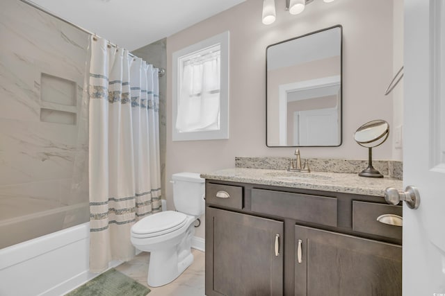 full bathroom featuring vanity, toilet, marble finish floor, and shower / bath combination with curtain