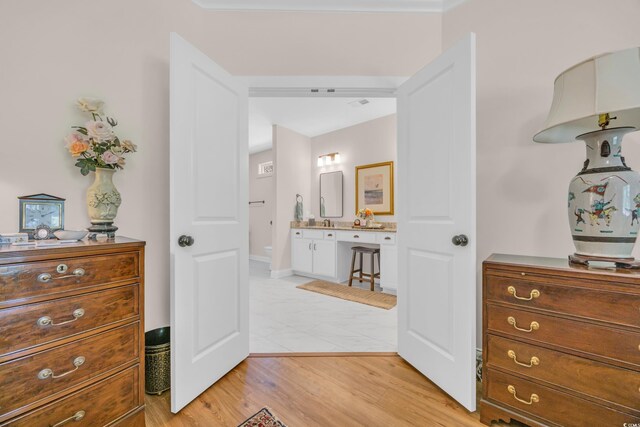 hallway featuring light wood-type flooring
