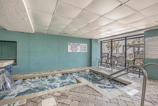 interior space with an indoor hot tub