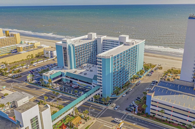 aerial view featuring a water view and a view of the beach