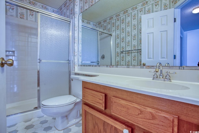 802 Mockingbird Ct, Murrells Inlet, SC 29576 - full bath featuring a textured ceiling, a shower stall, vanity, toilet, and wallpapered walls