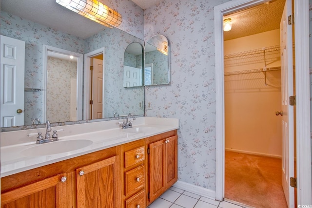 802 Mockingbird Ct, Murrells Inlet, SC 29576 - bathroom featuring double vanity, a sink, tile patterned floors, and a spacious closet