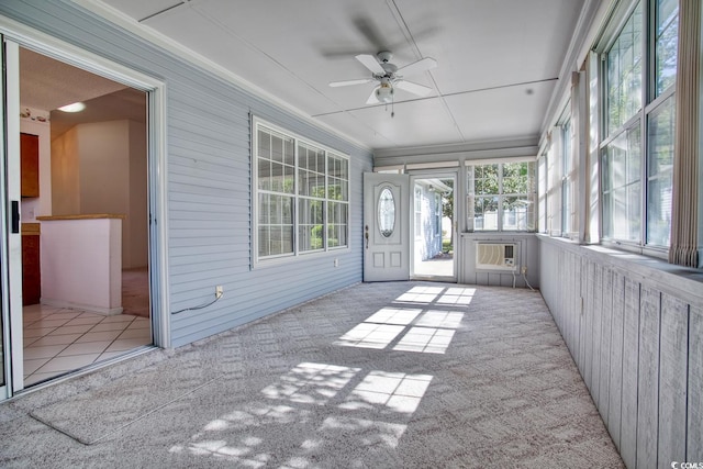 802 Mockingbird Ct, Murrells Inlet, SC 29576 - unfurnished sunroom with a ceiling fan, a wall mounted AC, and plenty of natural light