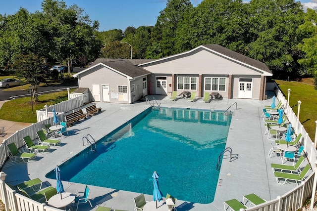 802 Mockingbird Ct, Murrells Inlet, SC 29576 - community pool featuring a patio, a fenced backyard, and french doors