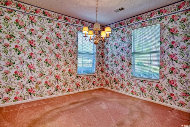 802 Mockingbird Ct, Murrells Inlet, SC 29576 - unfurnished dining area featuring a textured ceiling, visible vents, carpet floors, baseboards, and an inviting chandelier