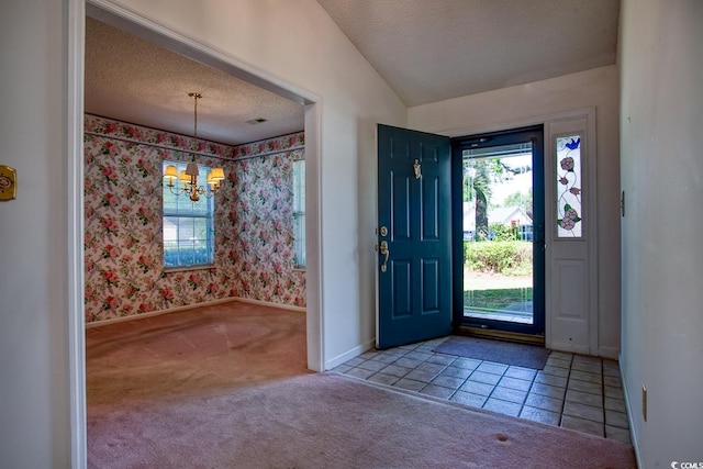 802 Mockingbird Ct, Murrells Inlet, SC 29576 - carpeted entryway featuring a textured ceiling, a notable chandelier, and a healthy amount of sunlight