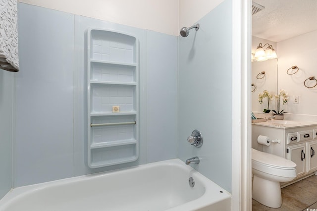 full bathroom with toilet, a textured ceiling, washtub / shower combination, and vanity