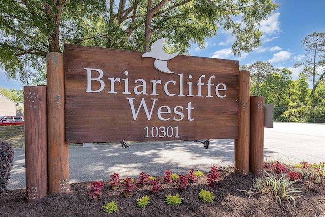 view of community sign