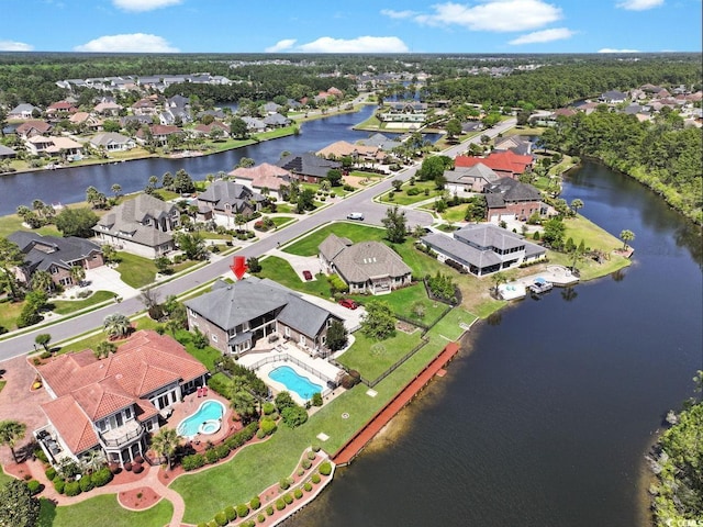 aerial view featuring a residential view and a water view