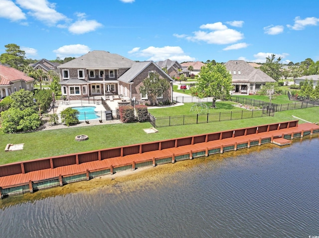 aerial view featuring a residential view and a water view