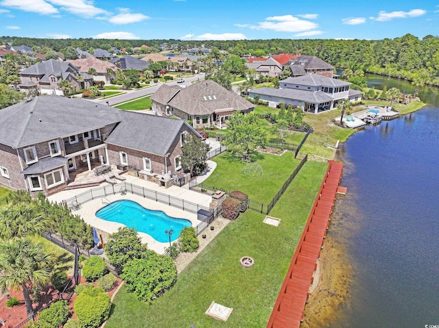 aerial view featuring a residential view and a water view