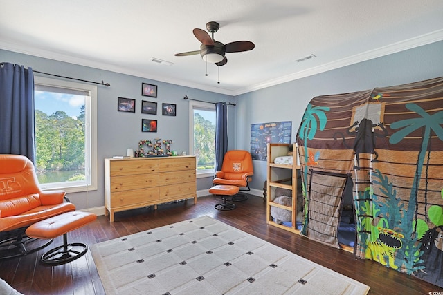 bedroom with baseboards, hardwood / wood-style floors, and visible vents