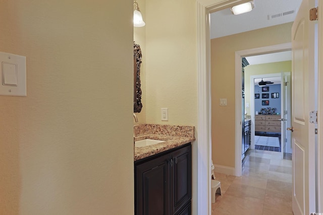 bathroom with visible vents and vanity