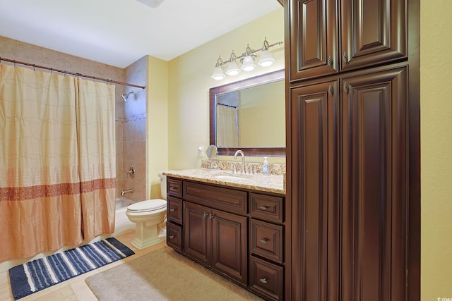 bathroom featuring tile patterned flooring, shower / bath combination with curtain, toilet, and vanity