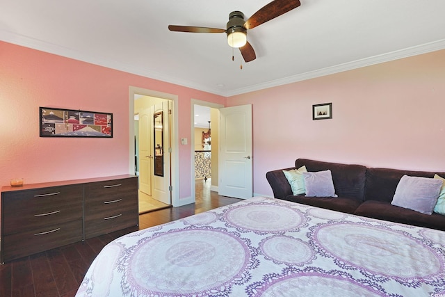 bedroom featuring baseboards, ornamental molding, a ceiling fan, and dark wood-style flooring