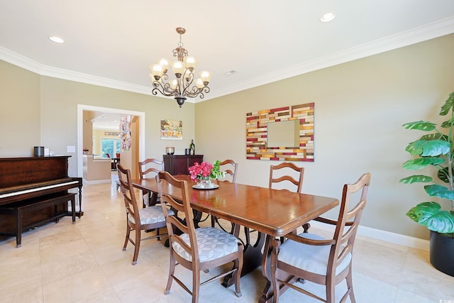 dining area with baseboards, a notable chandelier, ornamental molding, and light tile patterned floors