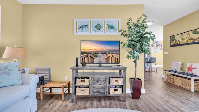 324 S Waccamaw Dr, Garden City Beach, SC 29576 - living room featuring wood finished floors and baseboards