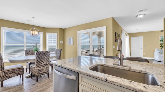 324 S Waccamaw Dr, Garden City Beach, SC 29576 - kitchen featuring a sink, decorative light fixtures, dishwasher, a notable chandelier, and light wood-style floors