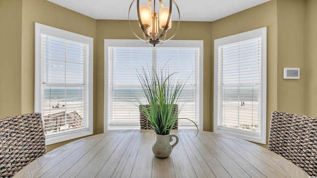 324 S Waccamaw Dr, Garden City Beach, SC 29576 - dining space with a notable chandelier