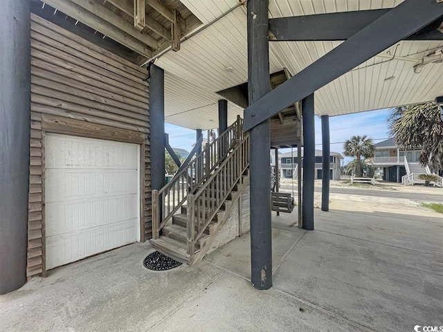 324 S Waccamaw Dr, Garden City Beach, SC 29576 - garage featuring driveway