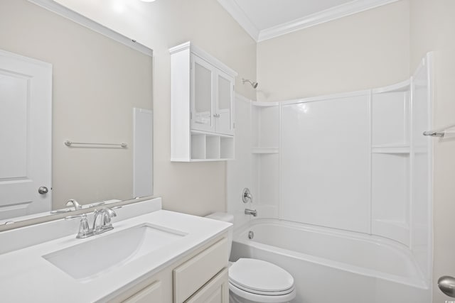 bathroom featuring toilet, ornamental molding, shower / bathing tub combination, and vanity
