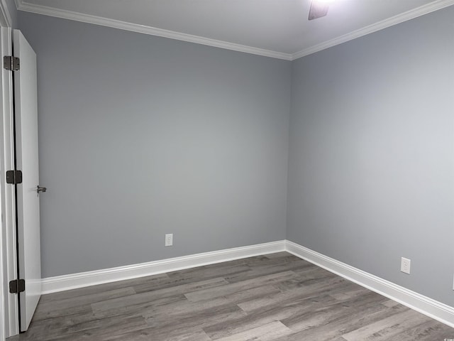 4350 Intercoastal Dr Unit 2302, Little River, SC 29566 - spare room featuring wood finished floors, ceiling fan, baseboards, and ornamental molding