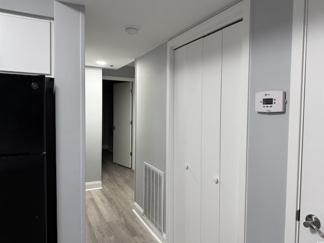 4350 Intercoastal Dr Unit 2302, Little River, SC 29566 - corridor with light wood-style flooring and baseboards