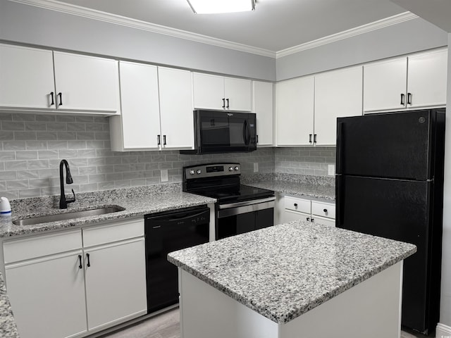 4350 Intercoastal Dr Unit 2302, Little River, SC 29566 - kitchen with black appliances, a sink, white cabinets, and ornamental molding