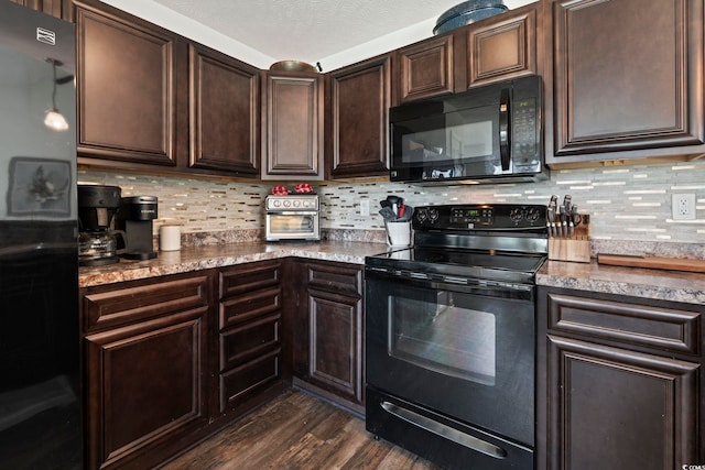 kitchen with dark wood-style floors, dark brown cabinetry, black appliances, and tasteful backsplash