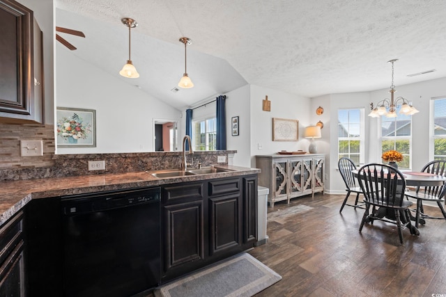 kitchen with a peninsula, dark wood-style floors, a sink, and dishwasher