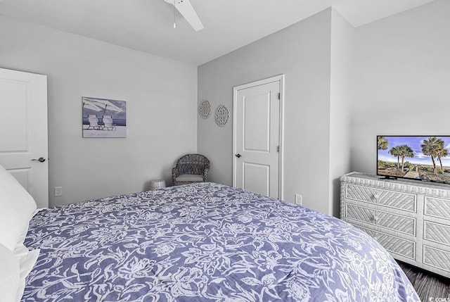 bedroom featuring a ceiling fan and wood finished floors