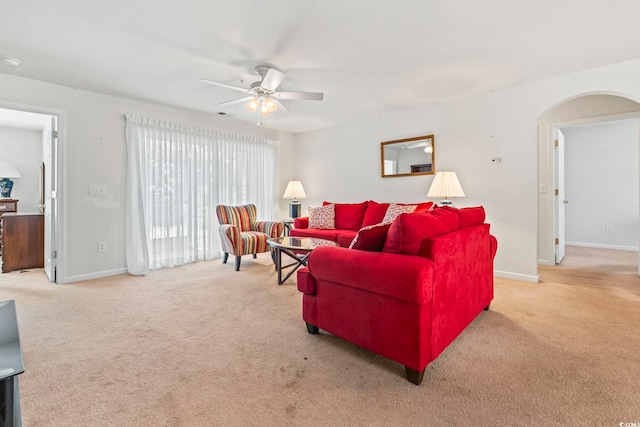 138 Butkus Dr Unit 2, Myrtle Beach, SC 29588 - living area featuring carpet floors, arched walkways, a ceiling fan, baseboards, and visible vents