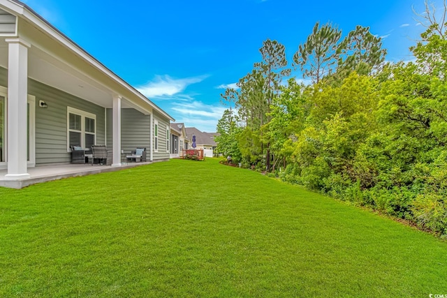 view of yard with a patio area