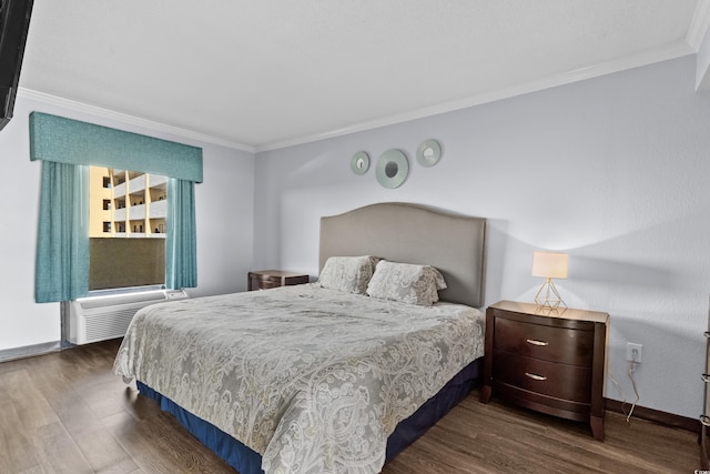 6900 N Ocean Blvd Unit 1105, Myrtle Beach, SC 29572 - bedroom featuring crown molding, dark wood-type flooring, radiator heating unit, and baseboards