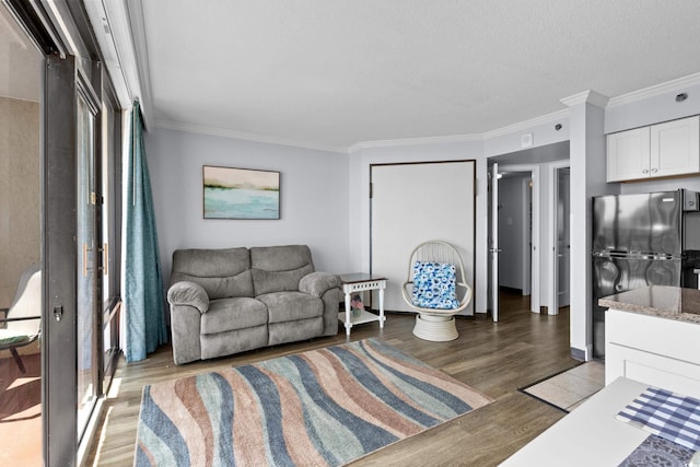 6900 N Ocean Blvd Unit 1105, Myrtle Beach, SC 29572 - living area featuring wood finished floors and crown molding