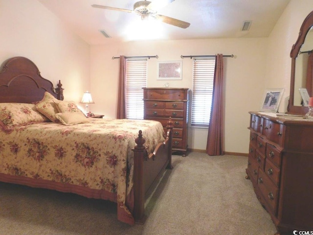 916 Charles St, North Myrtle Beach, SC 29582 - bedroom featuring visible vents, baseboards, ceiling fan, and light carpet