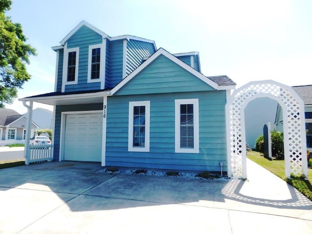 916 Charles St, North Myrtle Beach, SC 29582 - view of front of house with a garage and driveway