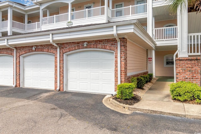 garage featuring driveway
